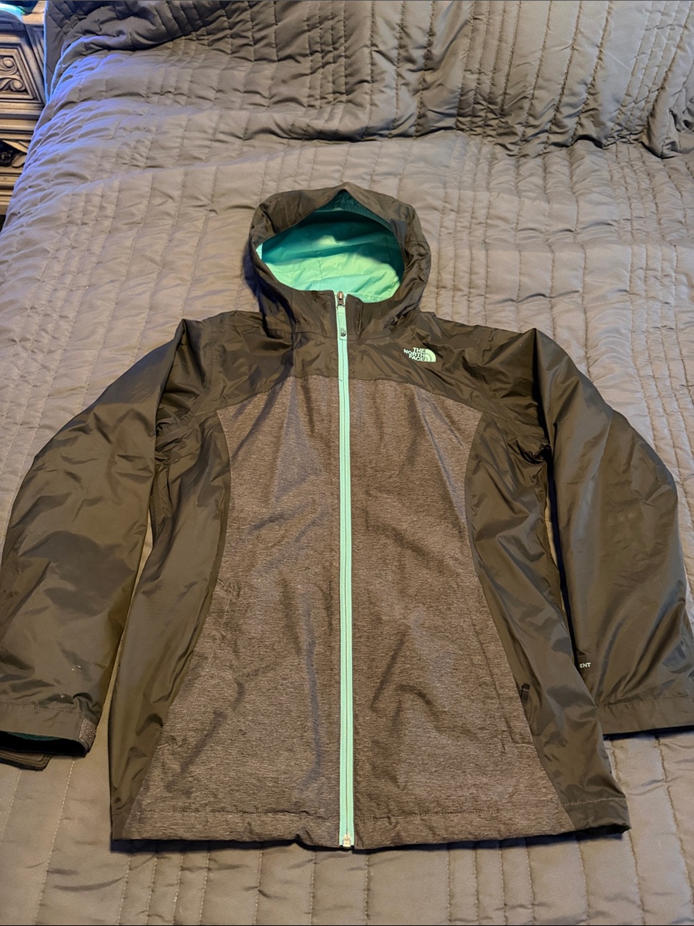 The North Face Black Jacket with Teal Accents - Kids Raincoat